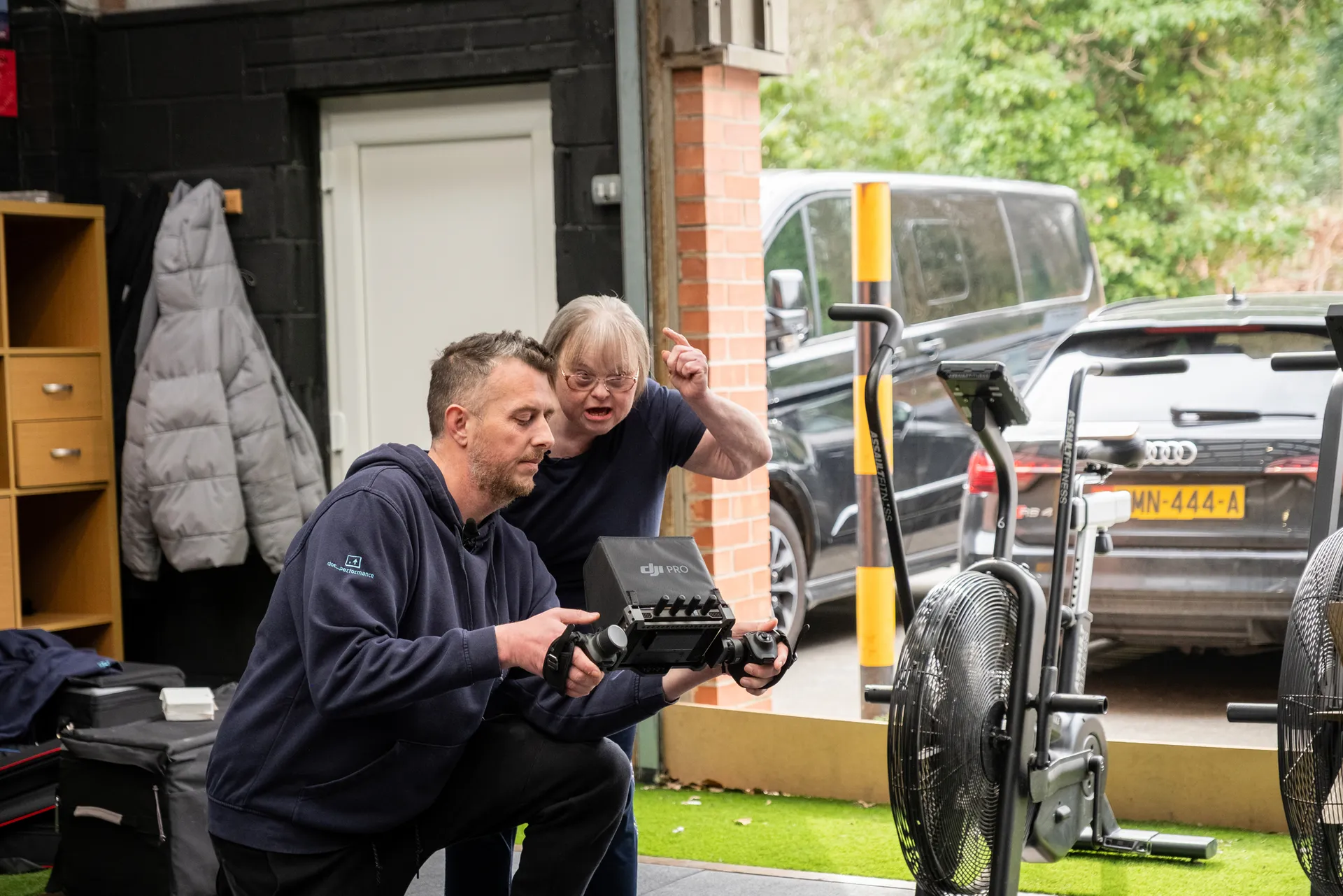 A camera operator filming Julie Naylor at MyGym